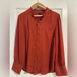 Burnt orange long sleeve button up tunic top